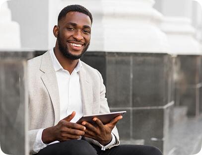 man holding a tablet